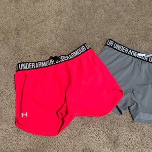 Under armor shorts . Pink and grey . Youth XL